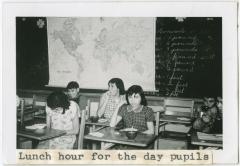 [Day pupils eating lunch, Norway House Indian Residential School]