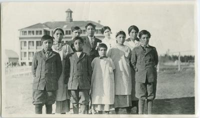 [Rev. Denyes with children from Poplar River who attend the Indian Boarding School at Norway House]