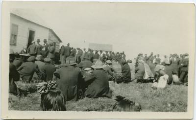 The quarterly council of the Cree Indians when they receive their treaty money from the government : the government agent is to be seen seated at the table, Norway House, Man.