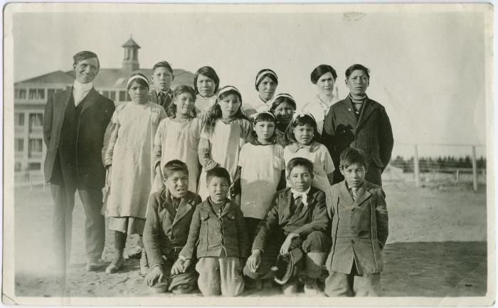 [Rev. Denyes with children from Cross Lake who attend the Indian Boarding School at Norway House]