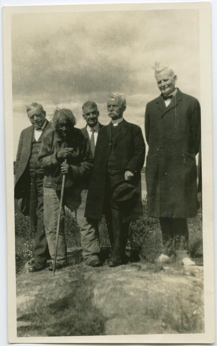 [Rev. T. Ferrier, Rev. J.T. Blackford?, Rev. J. Maclean, and Rev. S.D. Chown standing with John Memeno, the last Cree Indian to remember James Evans, Norway House, Man.]