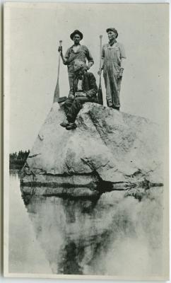 Three Indian guides on a rock, Norway House