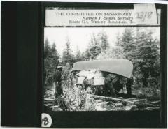 [Between Norway House and Oxford House, a distance of some two hundred miles, there were many portages, some as long as three miles : on this particular portage, there was a railroad track :  goods were loaded on to a small car which then had to be pulled : since there were no bridges one had to hold back just as hard going down hill as [one] had to pull going up]