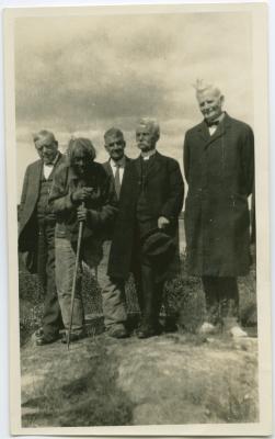 [Rev. T. Ferrier, Rev. J.T. Blackford?, Rev. J. Maclean, and Rev. S.D. Chown standing with John Memeno, the last Cree Indian to remember James Evans, Norway House, Man.]