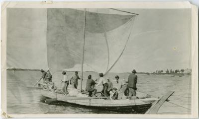 [An Indian crew setting sail for Oxford House carrying the missionary and his wife and child, Norway House, Man.]