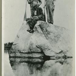 Three Indian guides on a rock, Norway House