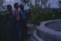 Some of the people who have gathered at the site of the cairn