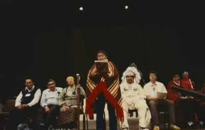 Speaking for the ANCC delegates, seated behind her on platform, Edith Membook, speaks to the 32nd General Council, after the constitution and covenanting service.