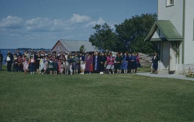[Long shot of a group of people]