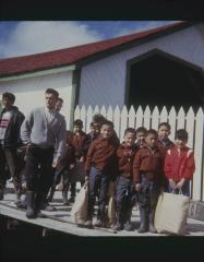 Children from the Old Norway Residential School, 1965, going home in June with new jackets