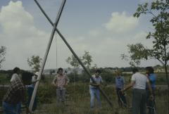 Erecting the tepees at General Council, on traditionally native land where the University in Sudbury is build before the native apology by the 31st General Council