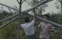 Erecting the tepees at General Council, on traditionally native land where the University in Sudbury is build before the native apology by the 31st General Council