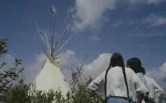 The tepees erected, admired by men and women at the 31st General Council, before the formal apology to the native people by the council.