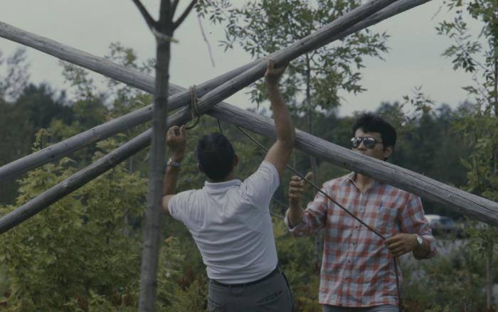 Erecting the tepees at General Council, on traditionally native land where the University in Sudbury is build before the native apology by the 31st General Council