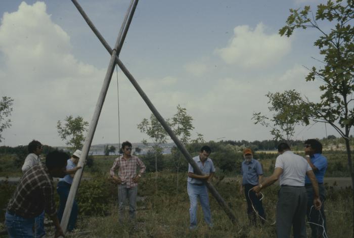 Erecting the tepees at General Council, on traditionally native land where the University in Sudbury is build before the native apology by the 31st General Council