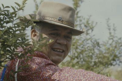 Lenny Watson sitting amongst the trees, during the apology of the 31st General Council to the Native peoples.