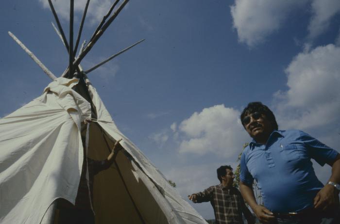 Floyd Steinheuer and friends erecting the teepees in the afternoon of General Council before the formal apology of the 31st General Council